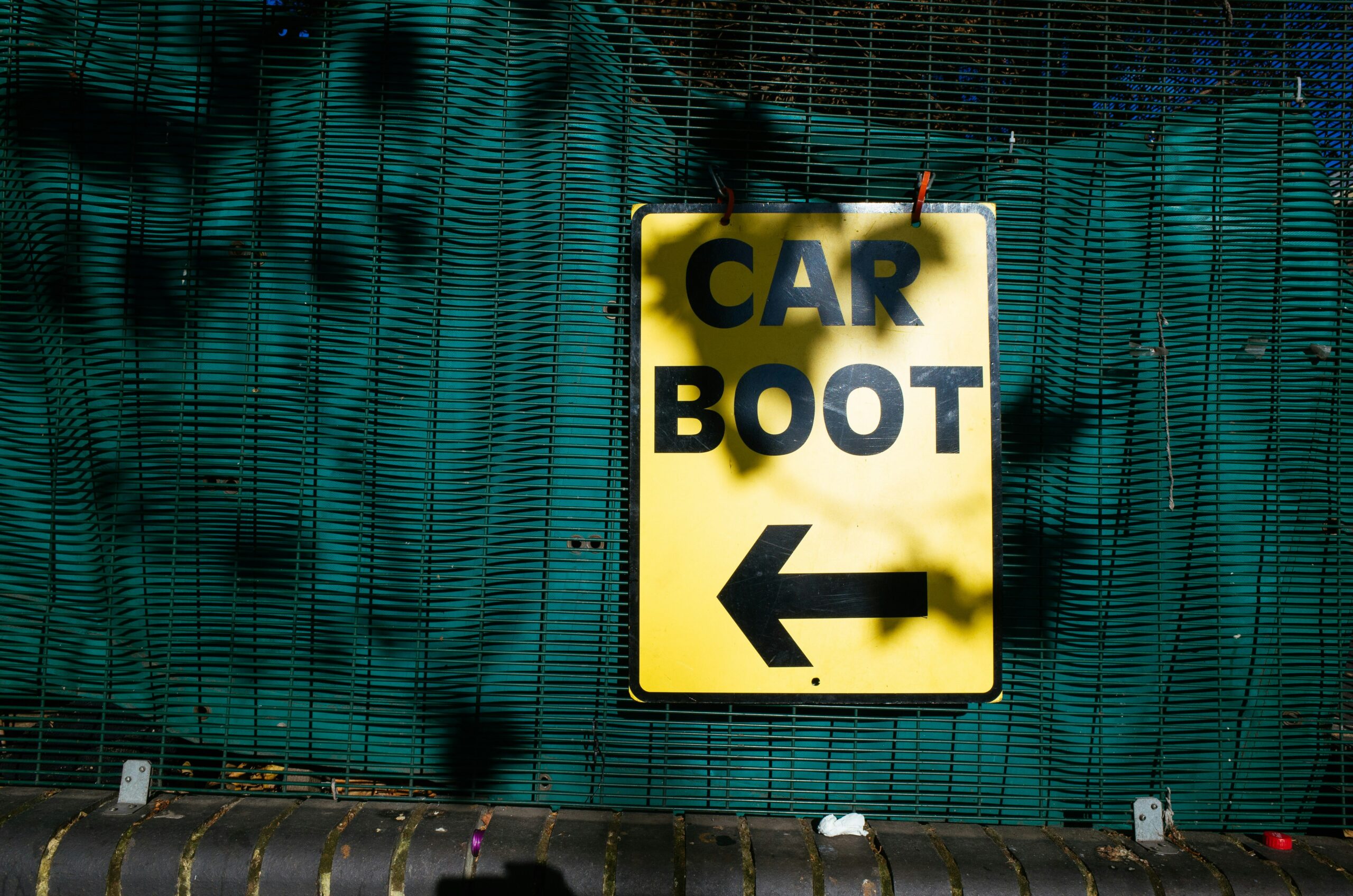 yellow car boot signage